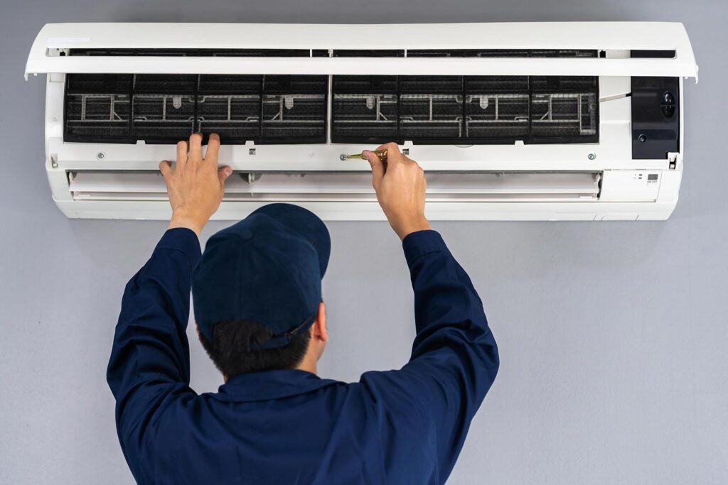 HVAC technician performing AC repair service in Central Florida