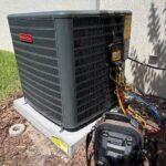 Wingman HVAC technician checking an outdoor AC unit during service in Central Florida