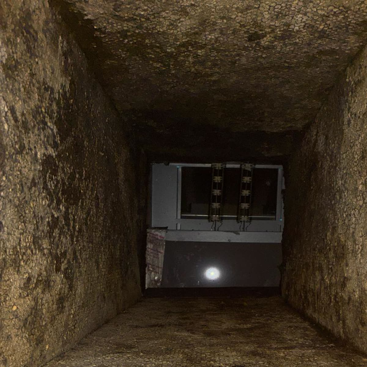 Dirty ductwork inside an HVAC air passage before cleaning